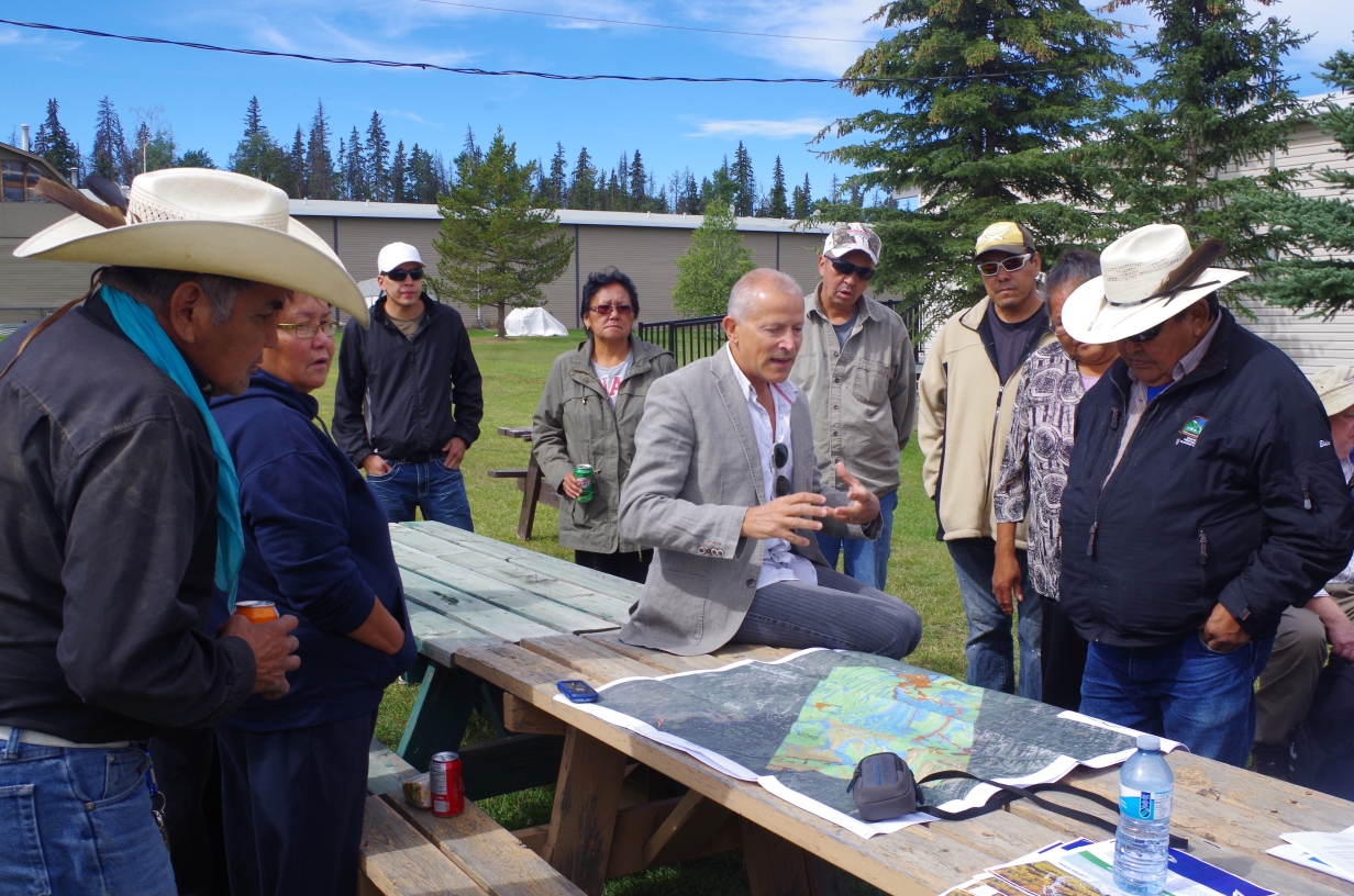 Carlos-Salas-VP-Geoscience-BC-reviewing-data-with-First-nations-people-in-peace-river-BC